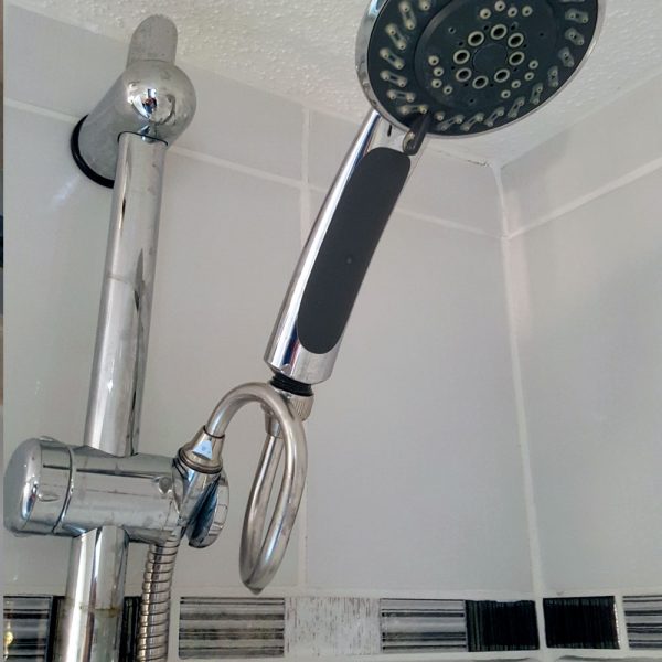 bathroom shower installed with Vortex Water Revitalizer