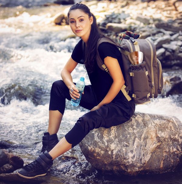 beautiful lady drinking a bottled water