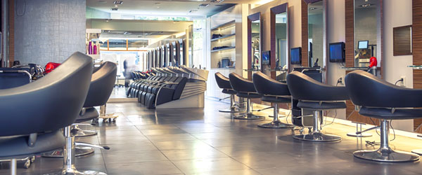 hair salon with black chairs