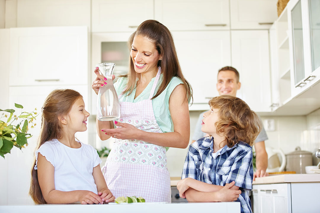 family enjoying covid safe water after using water filter 